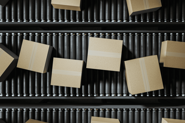 Box on conveyor platform used for sorting items.