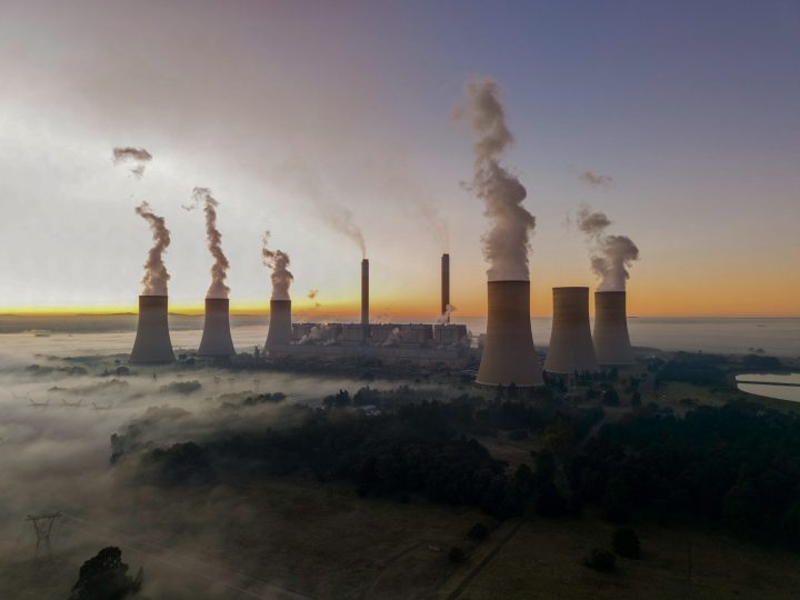seasonal insights article thumbnail displaying energy production plant in relation to the topic of AI and energy stocks