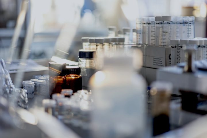 Laboratory vials and tubes representing the healthcare sector